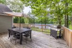 Enjoy the BBQ and sitting area on deck overlooking the pond
